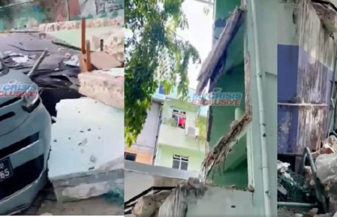 މާލޭގެ އިމާރާތެއްގެ ފާރު ވެއްޓި ވެހިކަލްތަކަށް ގެއްލުން ލިބިފައި---ފޮޓޯ: އެމްވީ ކްރައިސިސް ވީޑިއޯ